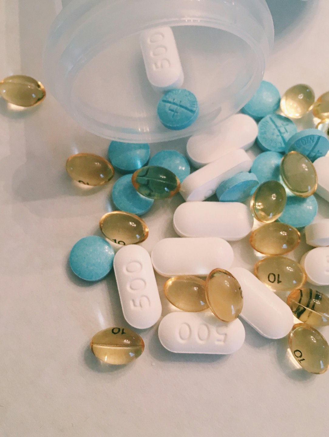 Softgel capsules and tablets